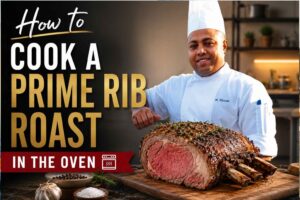 "Feature image for a prime rib roast recipe showing a smiling chef in a white uniform standing beside a perfectly roasted bone-in prime rib on a wooden cutting board. Large bold text reads 'How to Cook a Prime Rib Roast in the Oven' against a modern kitchen background with garlic, herbs, and seasonings in the foreground."